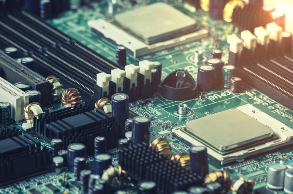 Close view of a populated circuit board with processors and power components